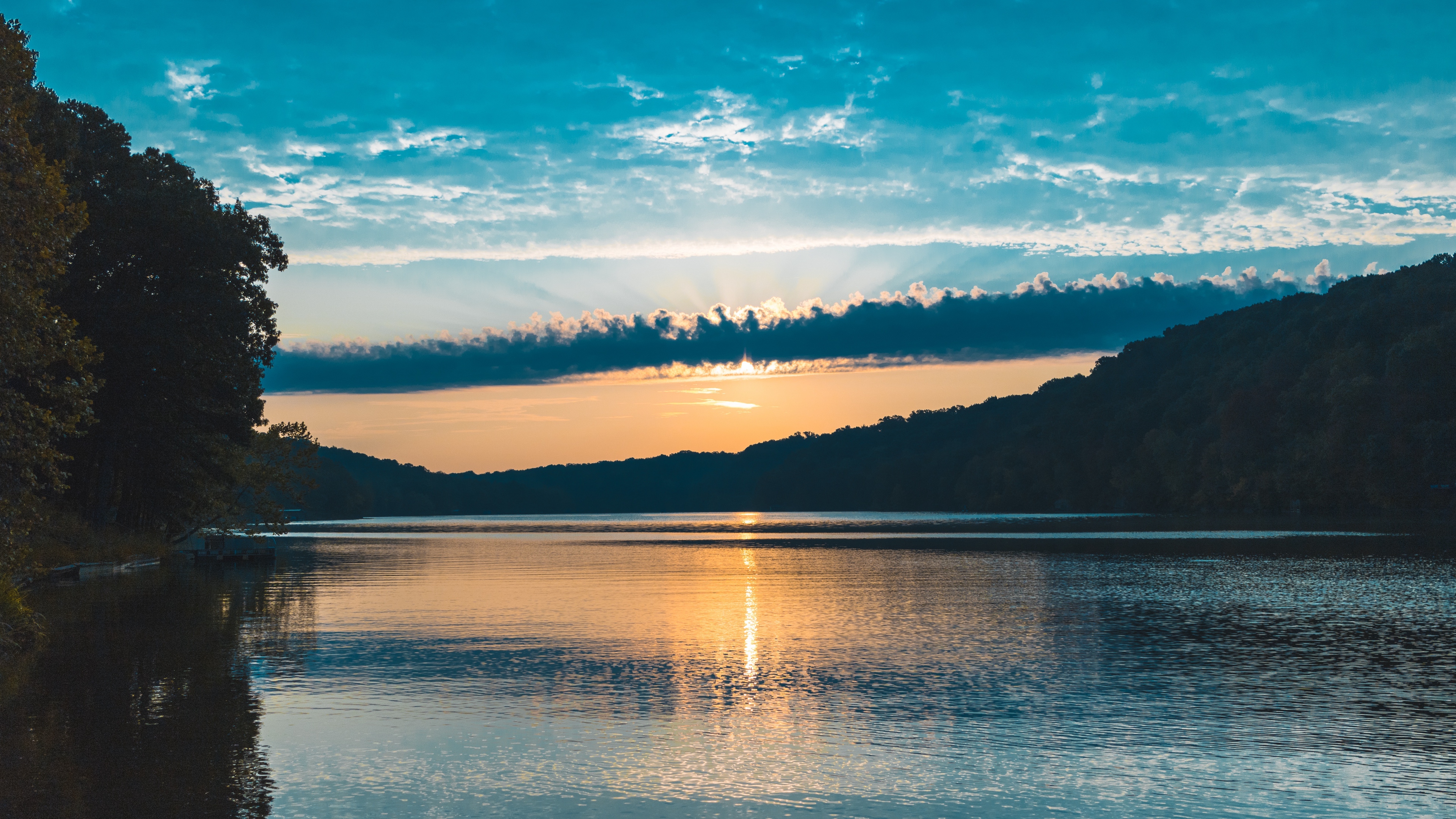 river sunset trees clouds 4k 1541117590