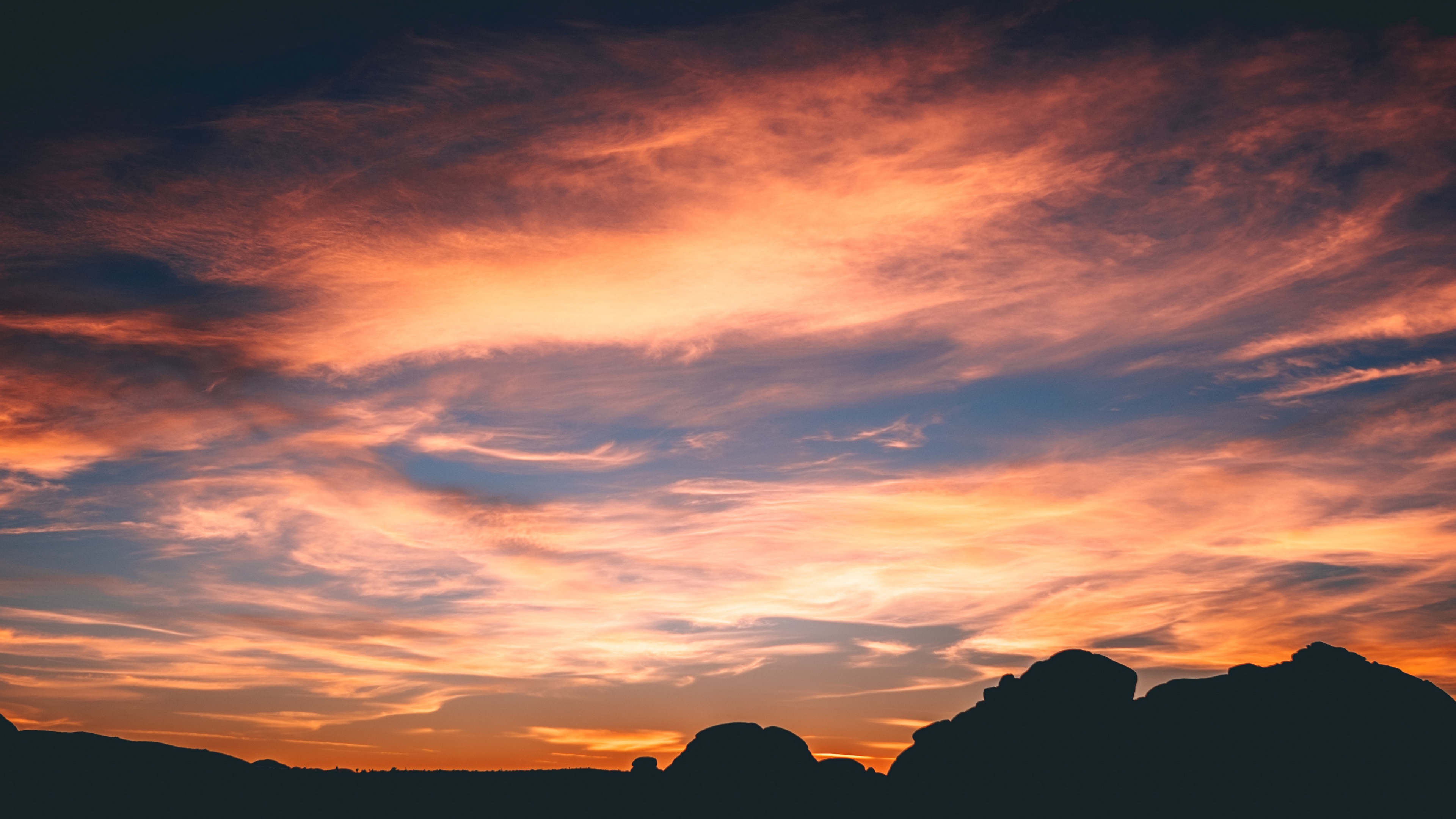 rocks sky clouds 4k 1541117468