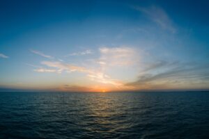 sea horizon sunset clouds sky 4k 1541116681