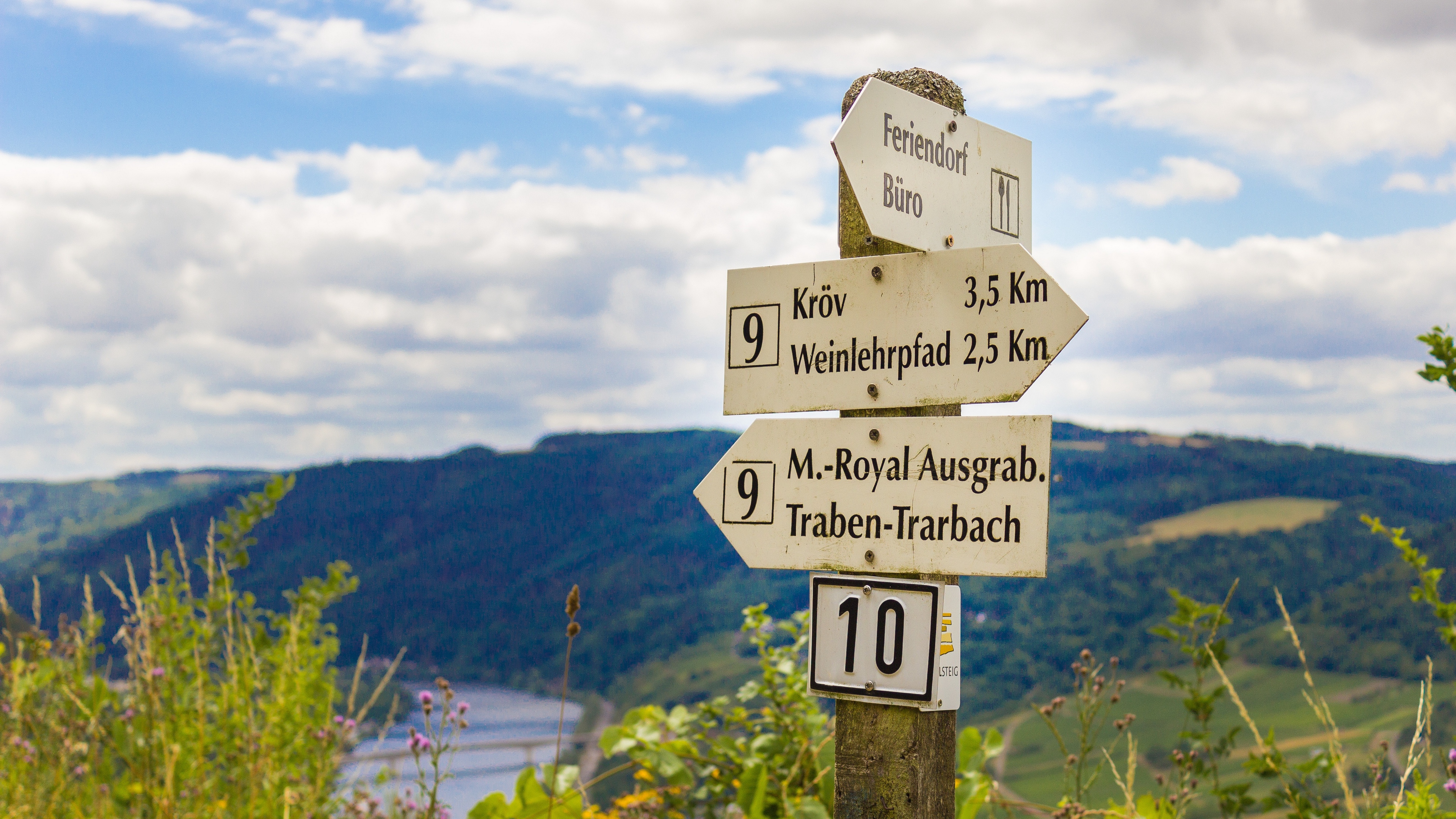 signs germany pole directions mountains 4k 1541115885