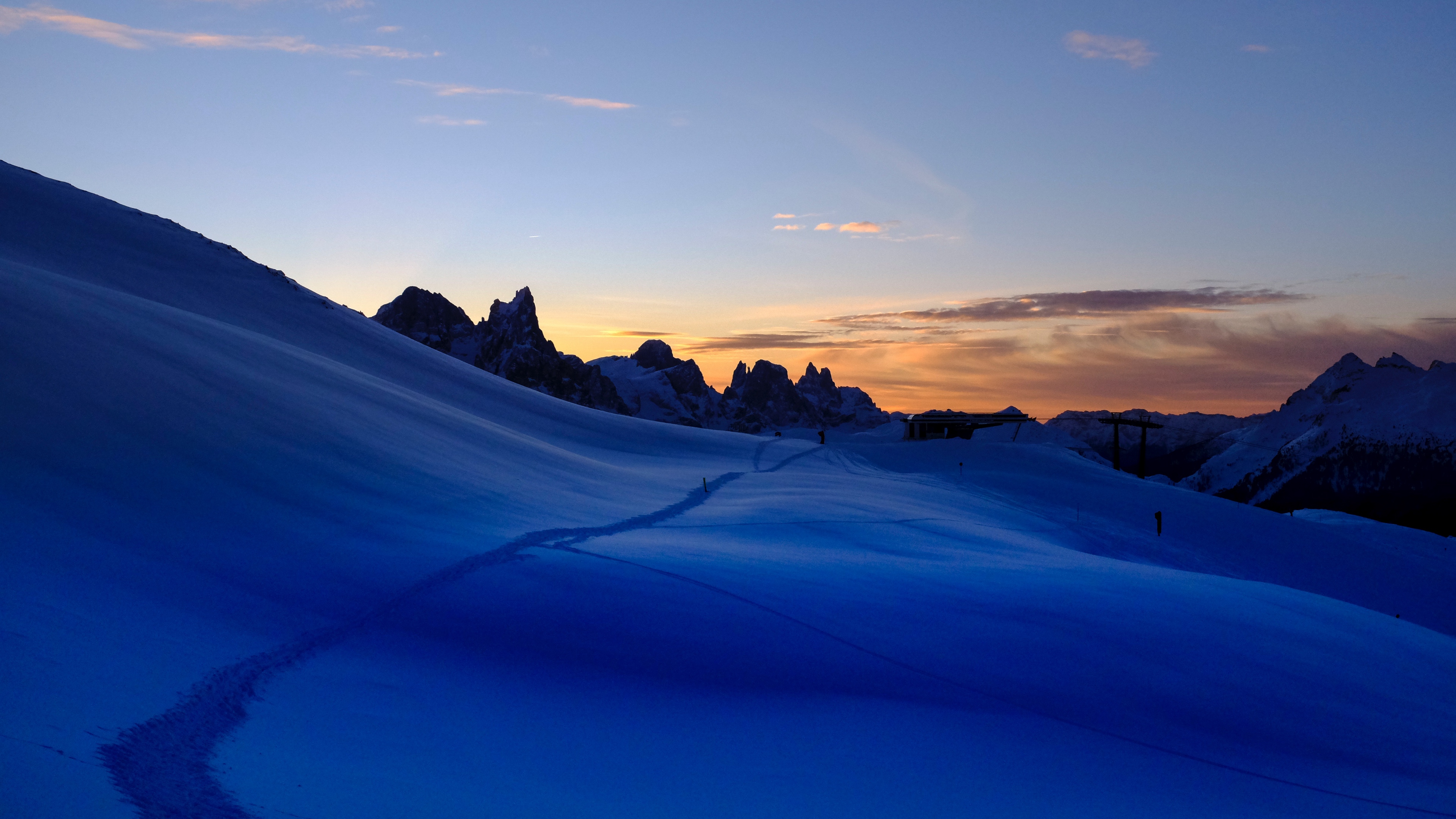 snow trail mountains sky 4k 1541117854