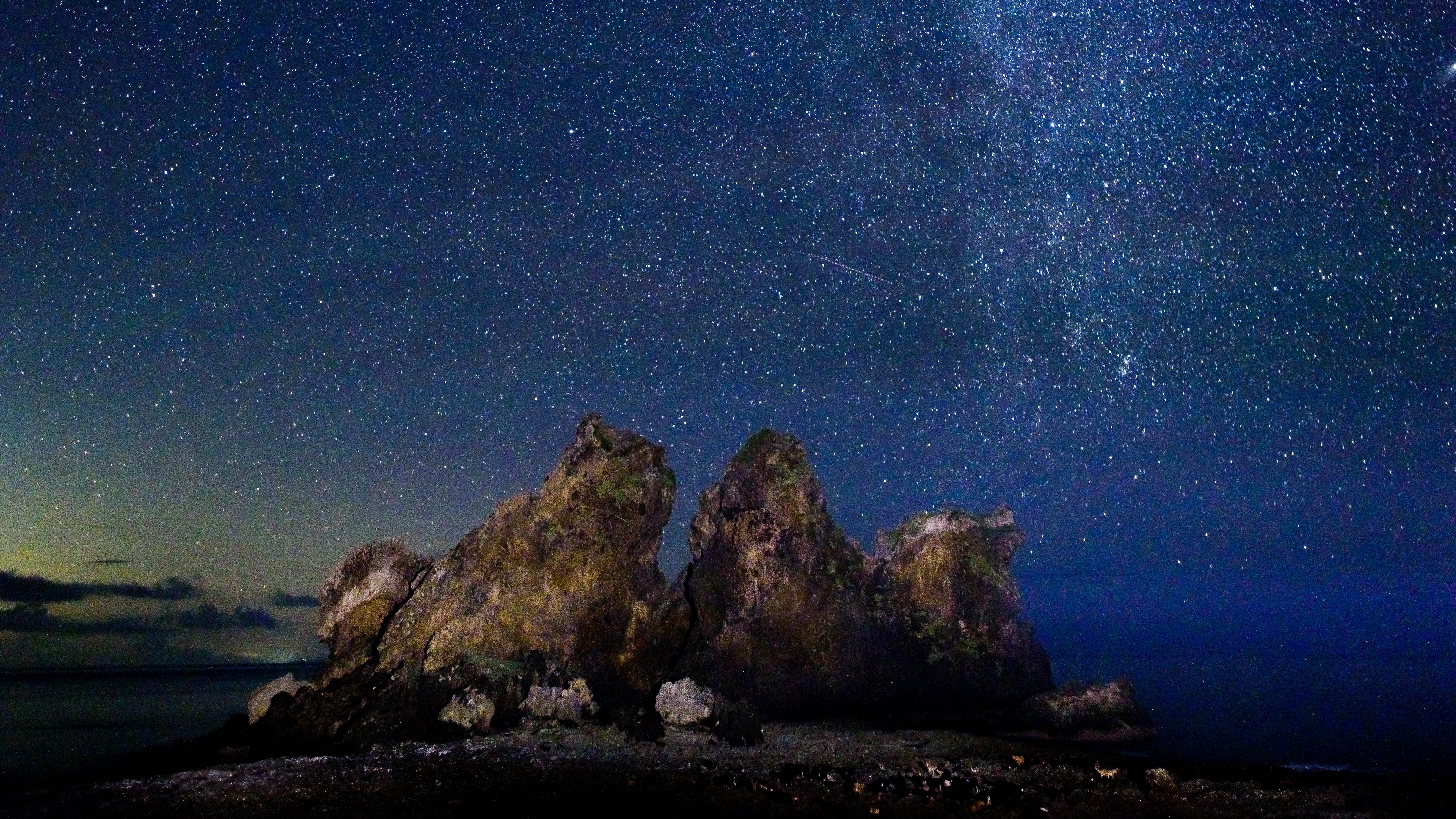 starry sky milky way stars rocks 4k 1541115228