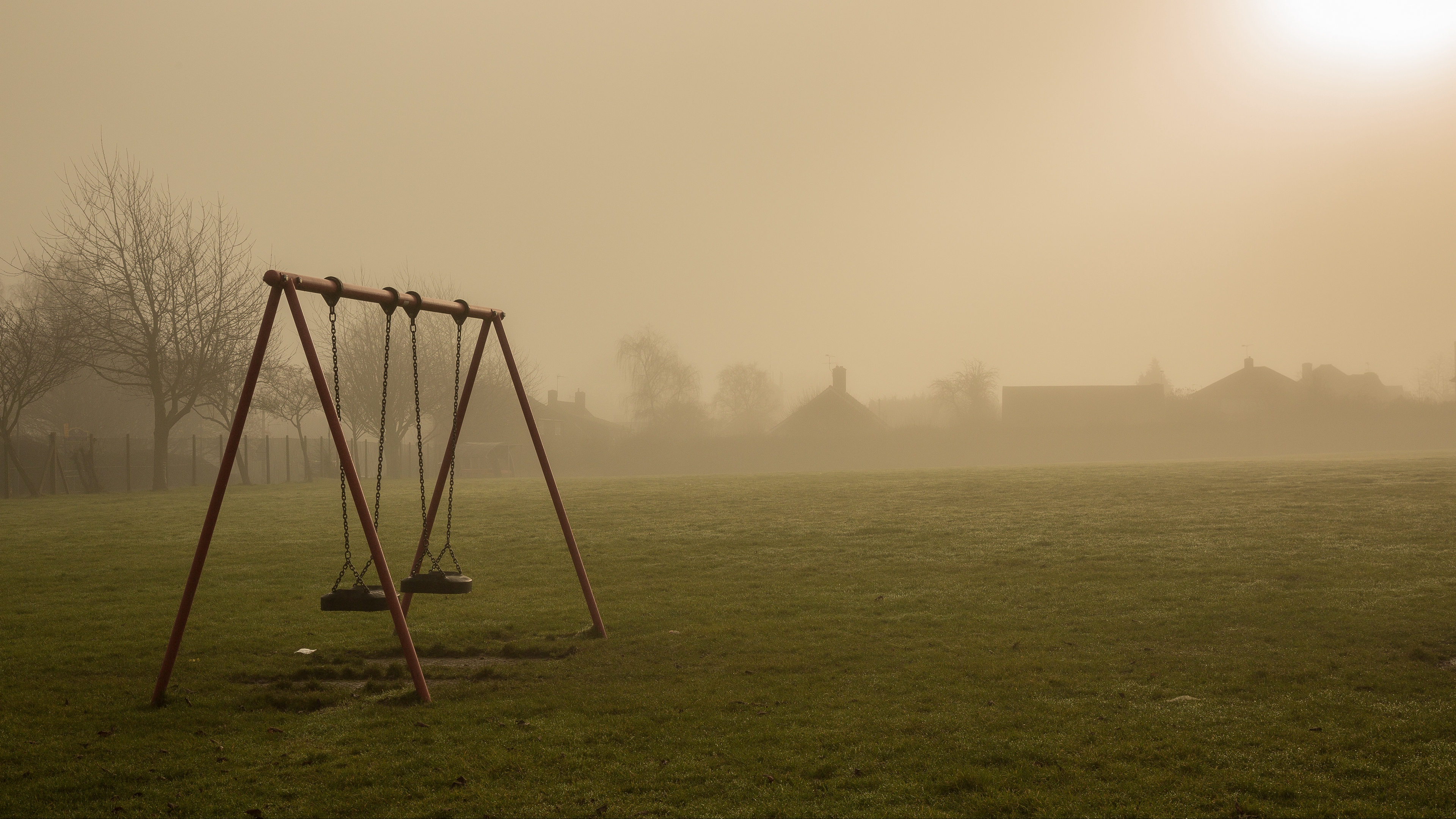 swings fog sunrise emptiness desertedness 4k 1541115188