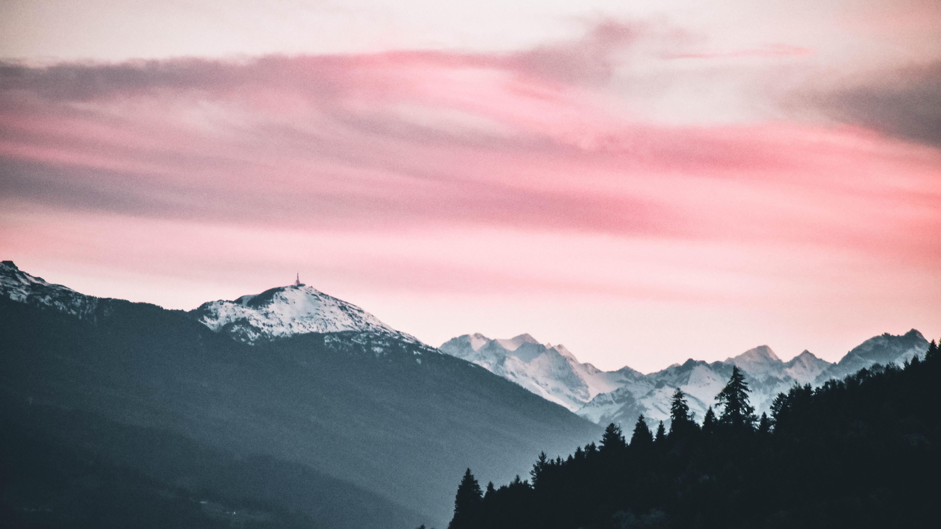 snow capped mountains under the cloudy skies 4k 1551643815