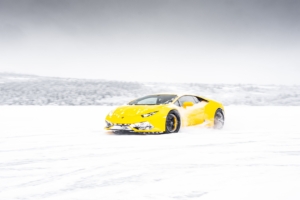 yellow lamborghini aventador in snow 4k 1556185177