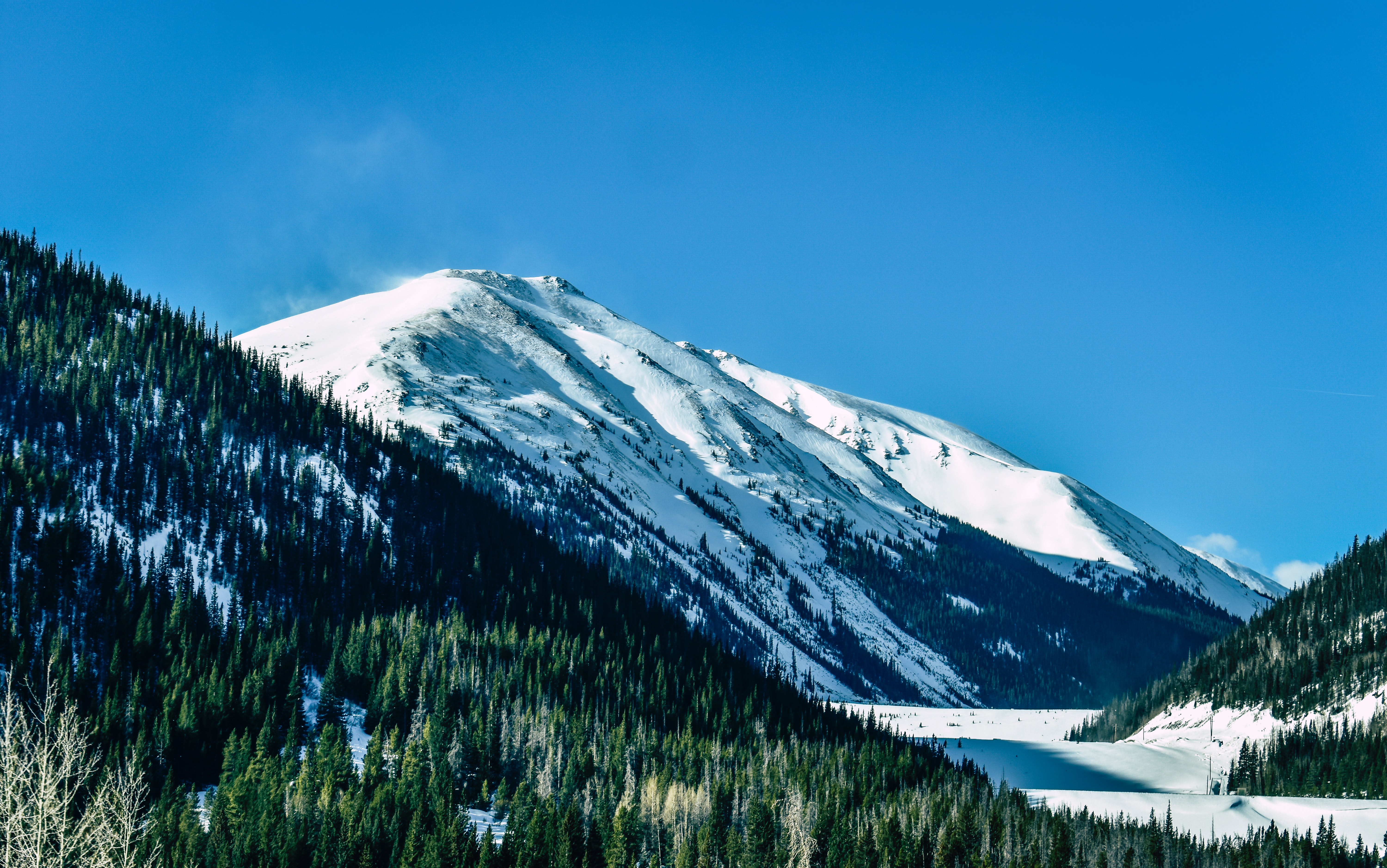 snow capped mountains daylight 1574939571