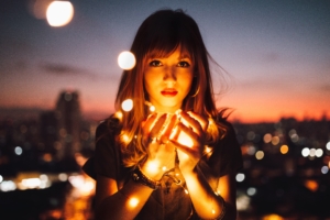 girl holding fire flies 1575664517