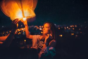 girl holding paper lantern 1575664744