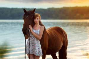 girl horse ocean side 1575666236