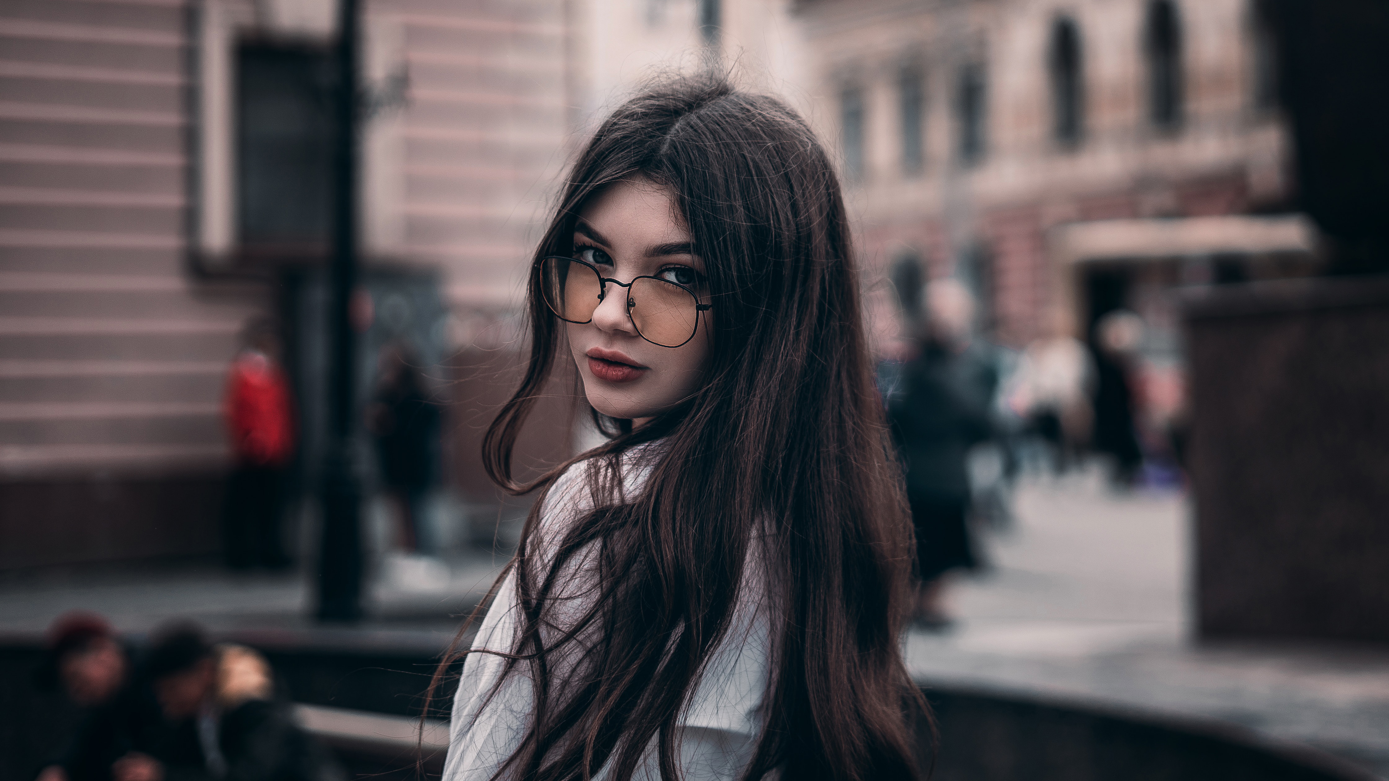 girl in glasses looking back 1575666219