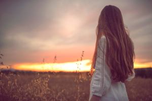 girl in nature of field 1575665369