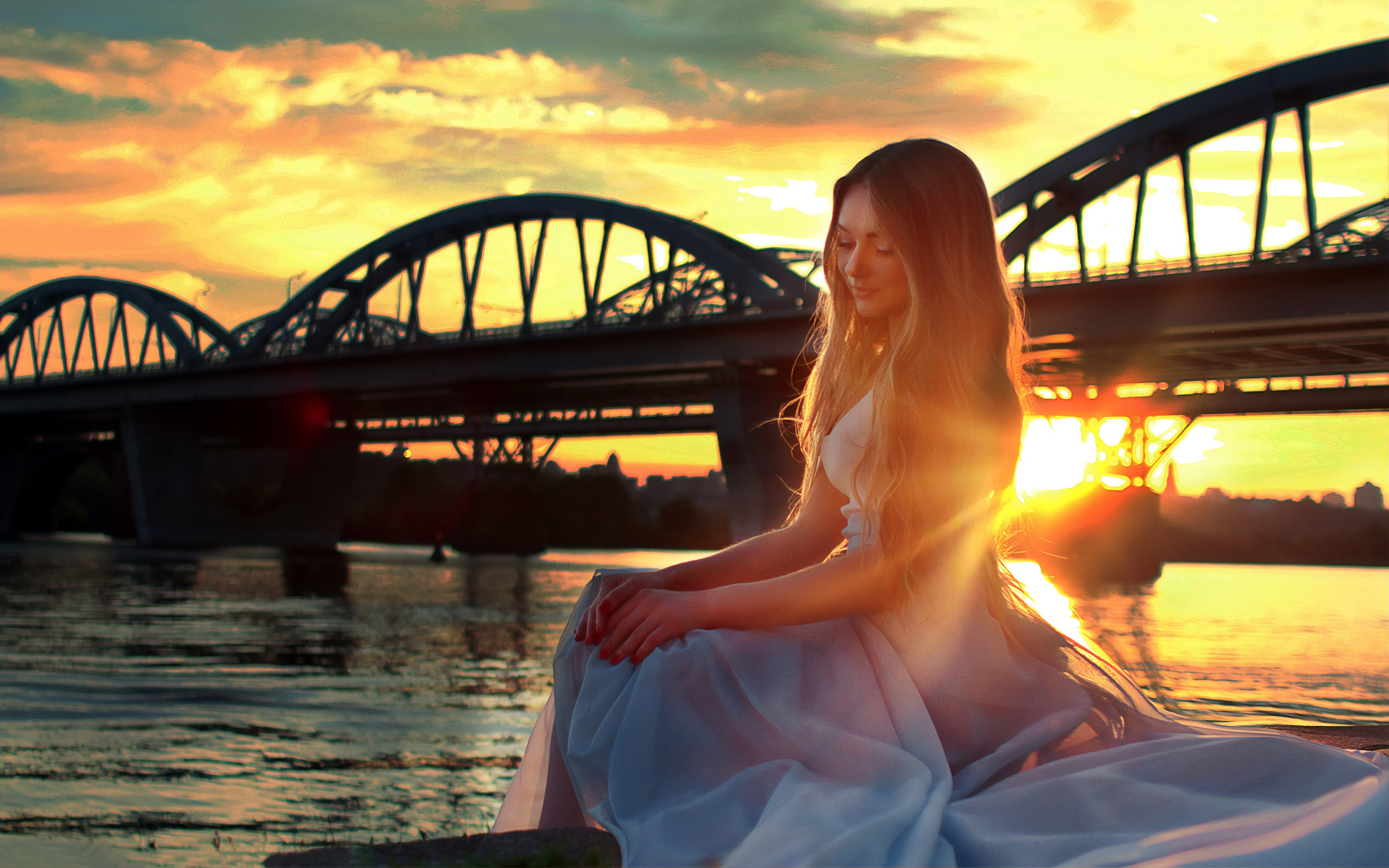 girl sitting on bridge side 1575665541