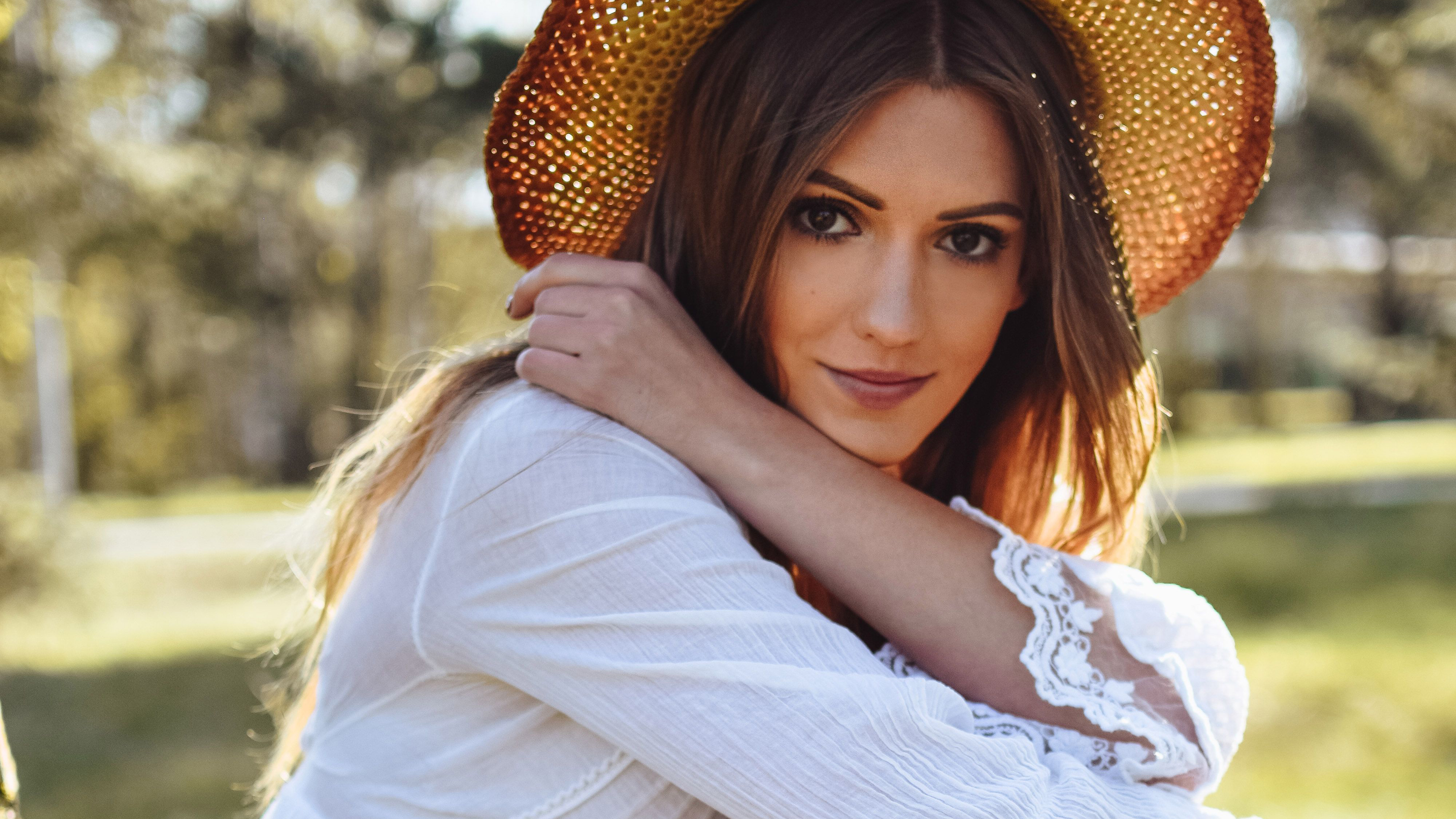 girl wearing hat outdoors 1575665496