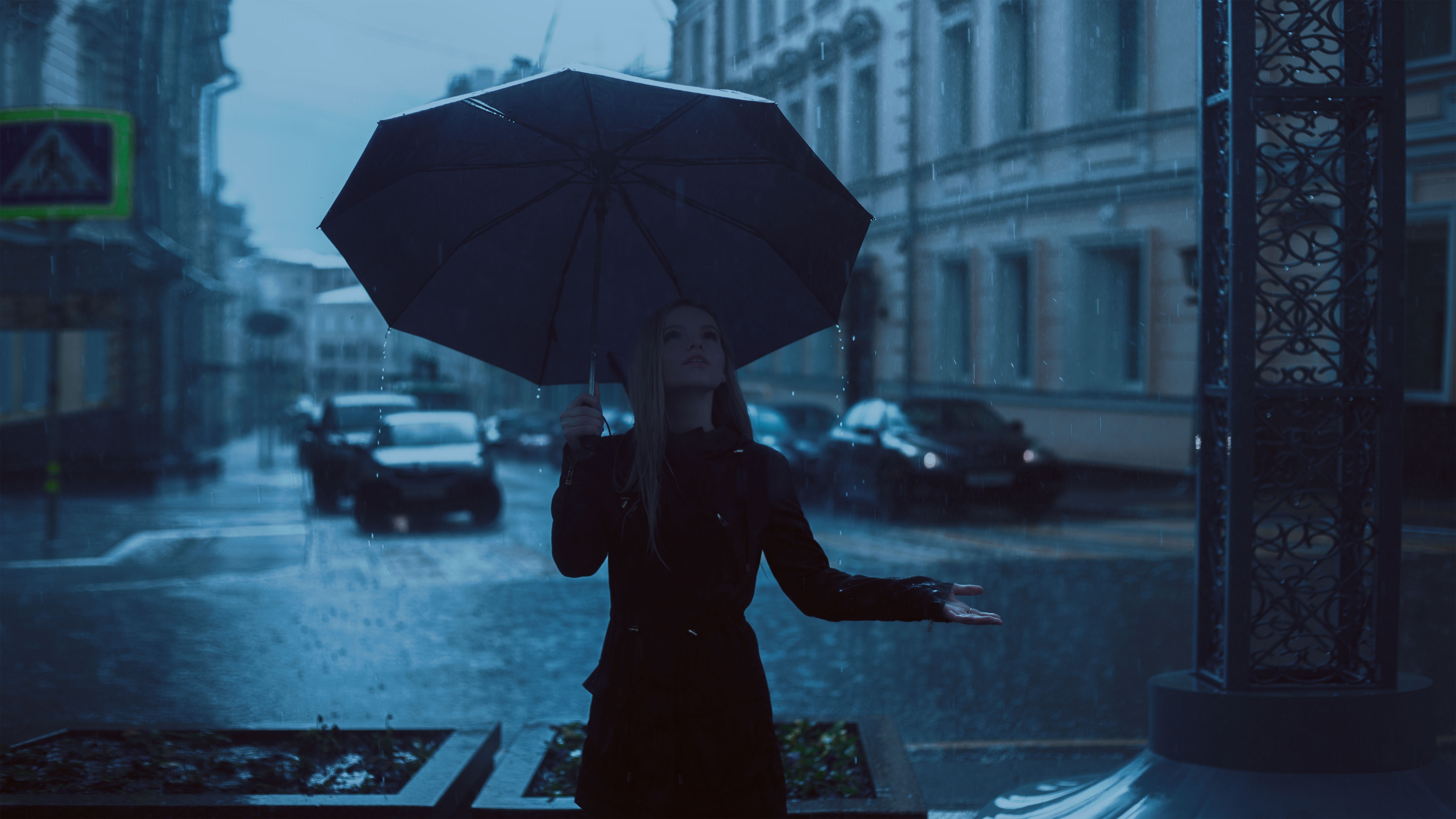 girl with umbrella enjoying rain 1575664029