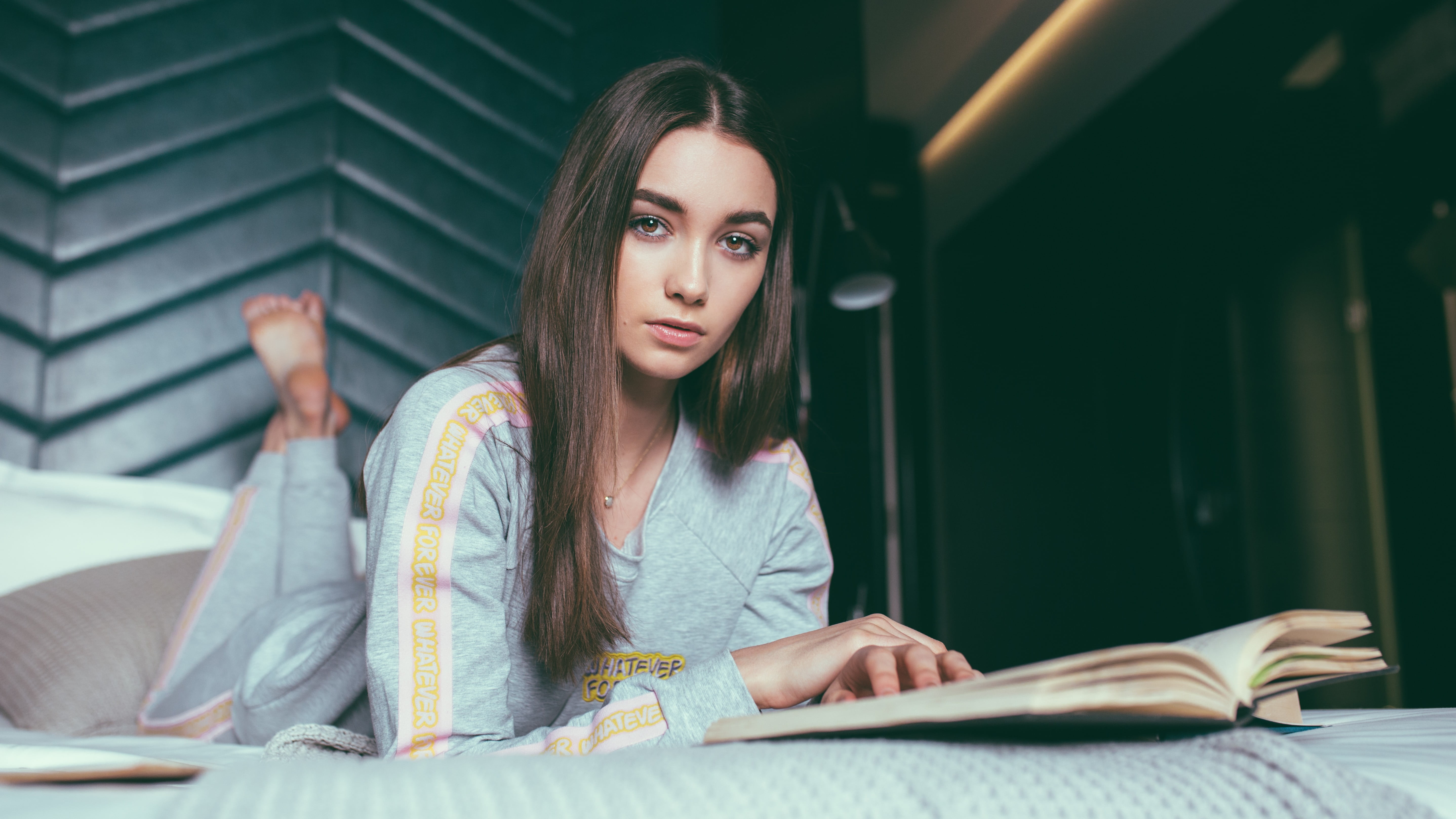 model posing with book 1575664514