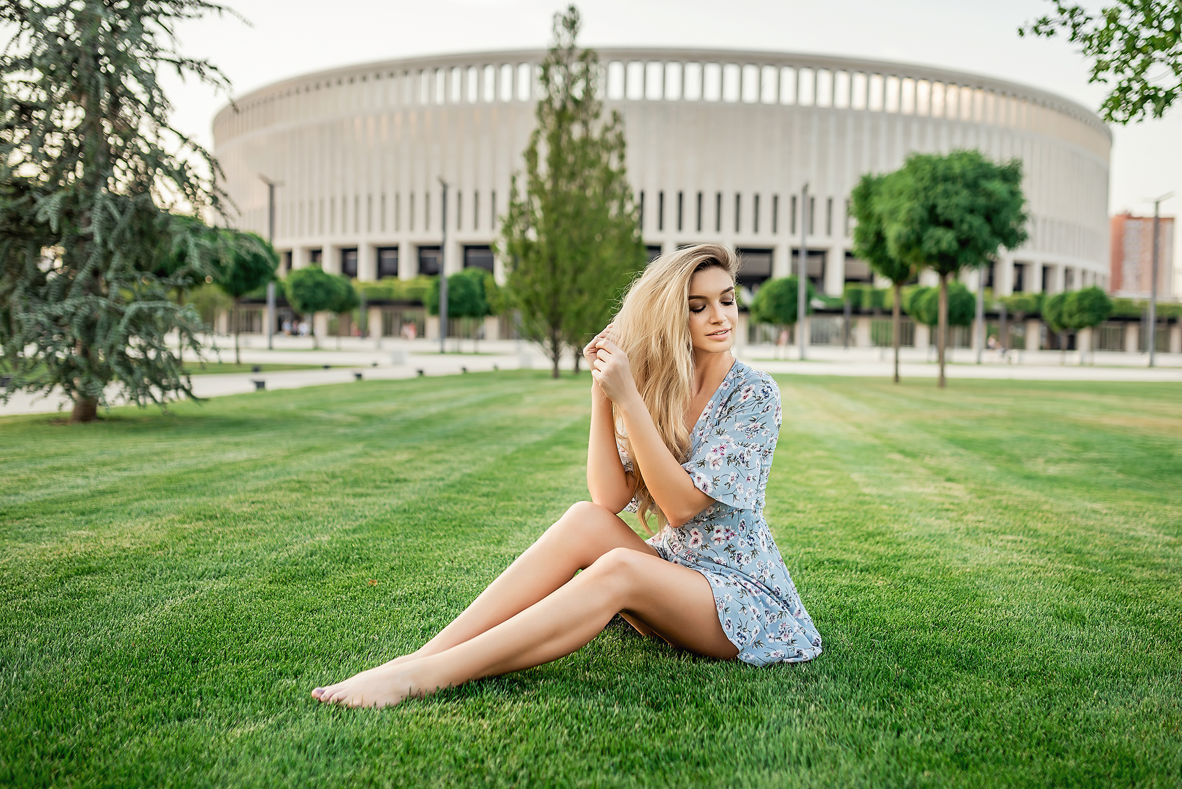 blonde girl sitting in park 1596916182