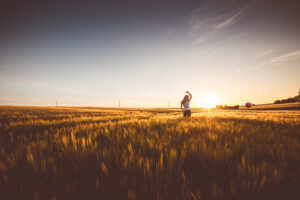 girl field sunrise and sunset horizon 4k 1596916190