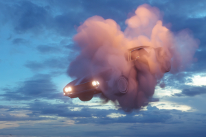 car in clouds 4k 1614443386