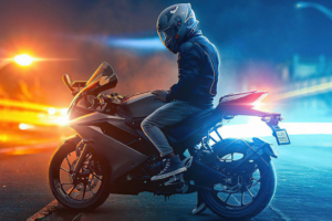 biker on road lights 4k 1616876274