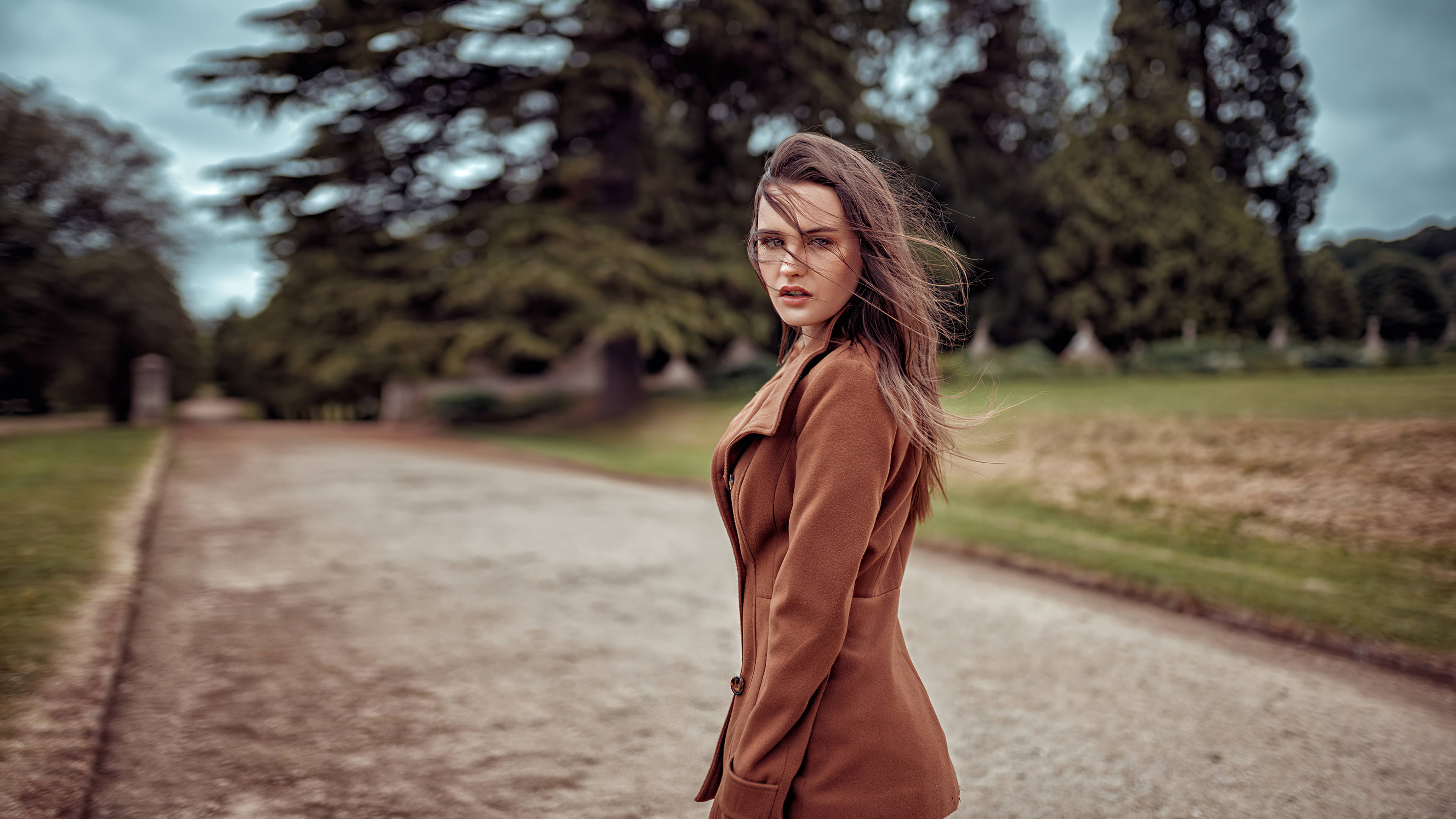 girl brown coat looking back 4k 1629237274