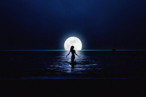 girl walking towards moon in ocean 4k 1634170484