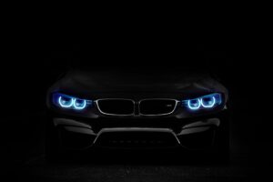 bmw headlights lights car dark 4k 1691771365