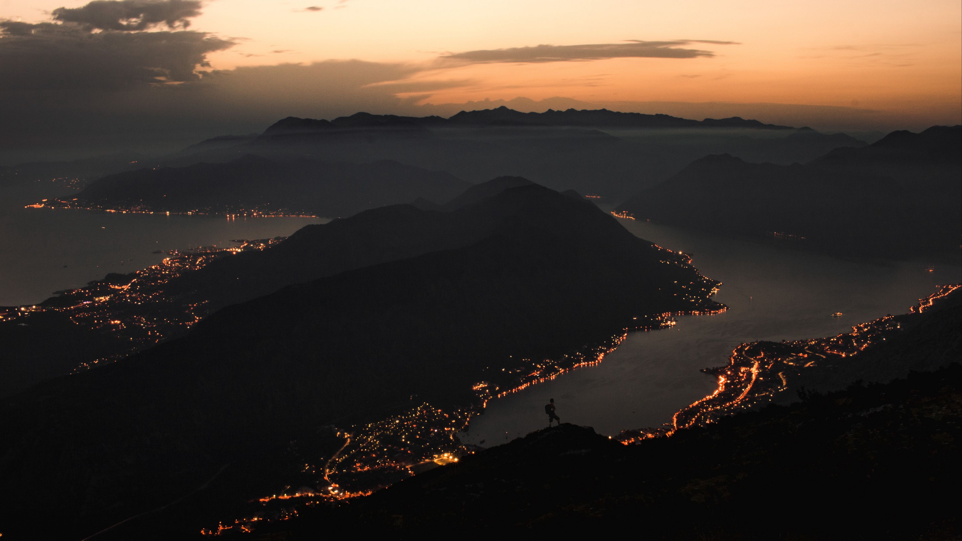 mountains coast aerial view city night lights 4k 1691839436