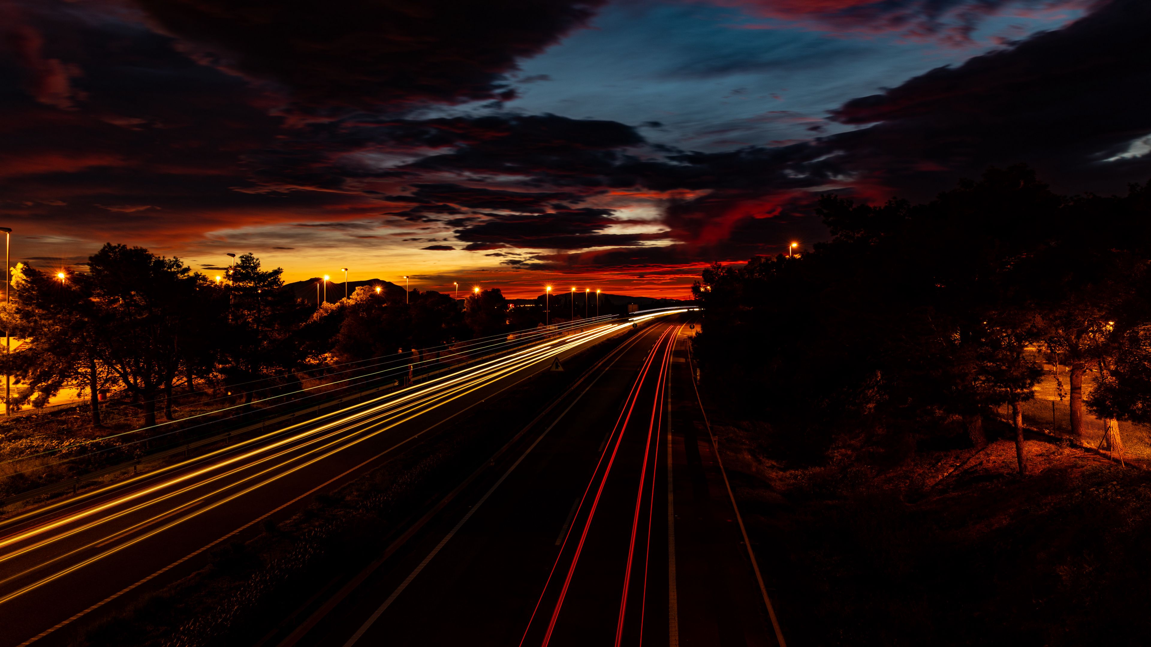 road light long exposure trees sunset dark 4k 1692006750