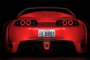 toyota supra toyota sportscar red rear view dark backlight 4k 1691828627