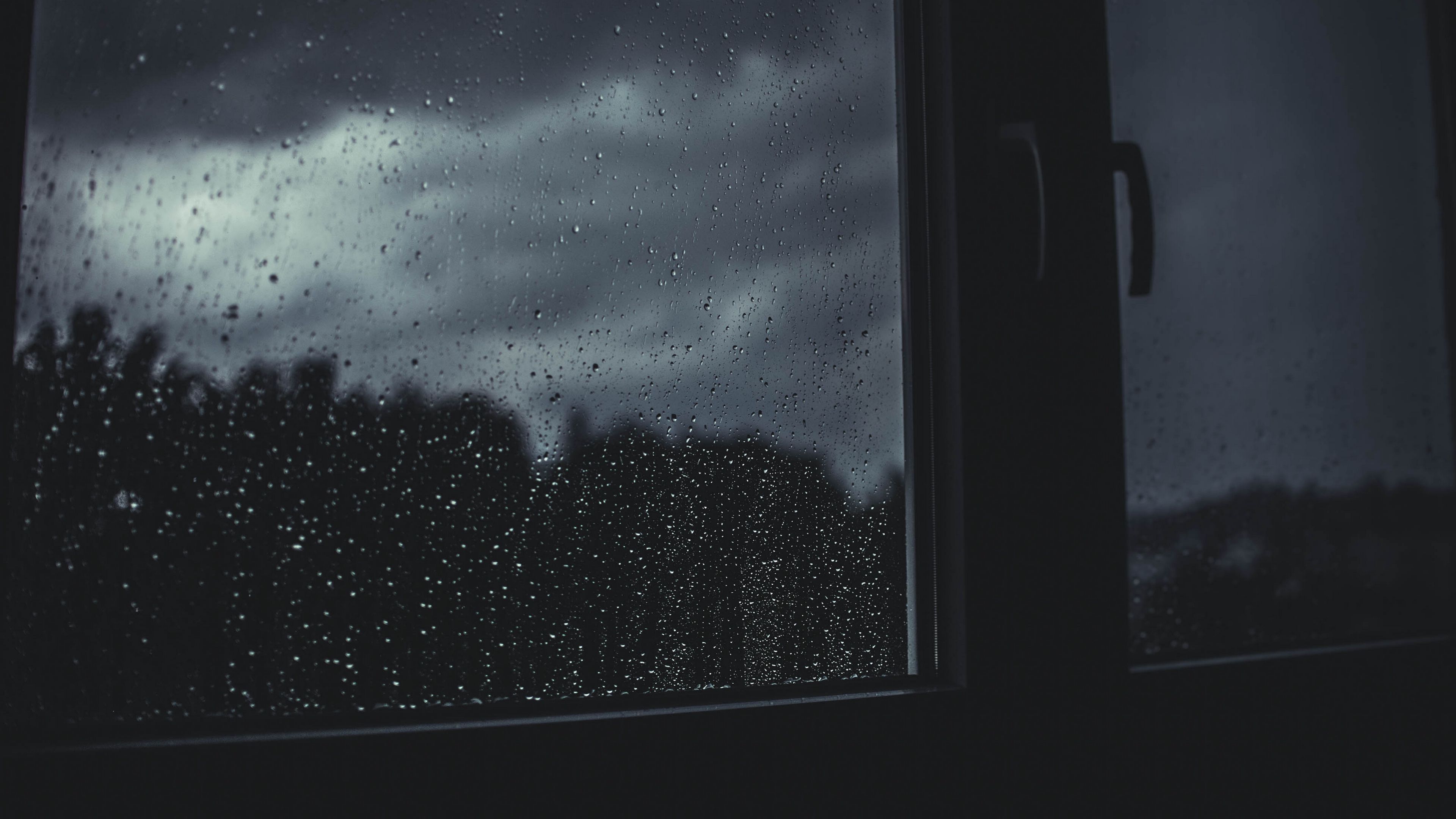 window drops rain blur 4k 1691839434