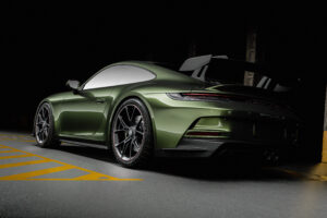 green porsche 918 rear 4k 1697728441