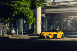 toyota supra dt yellow vossen bagged car road 1698679097