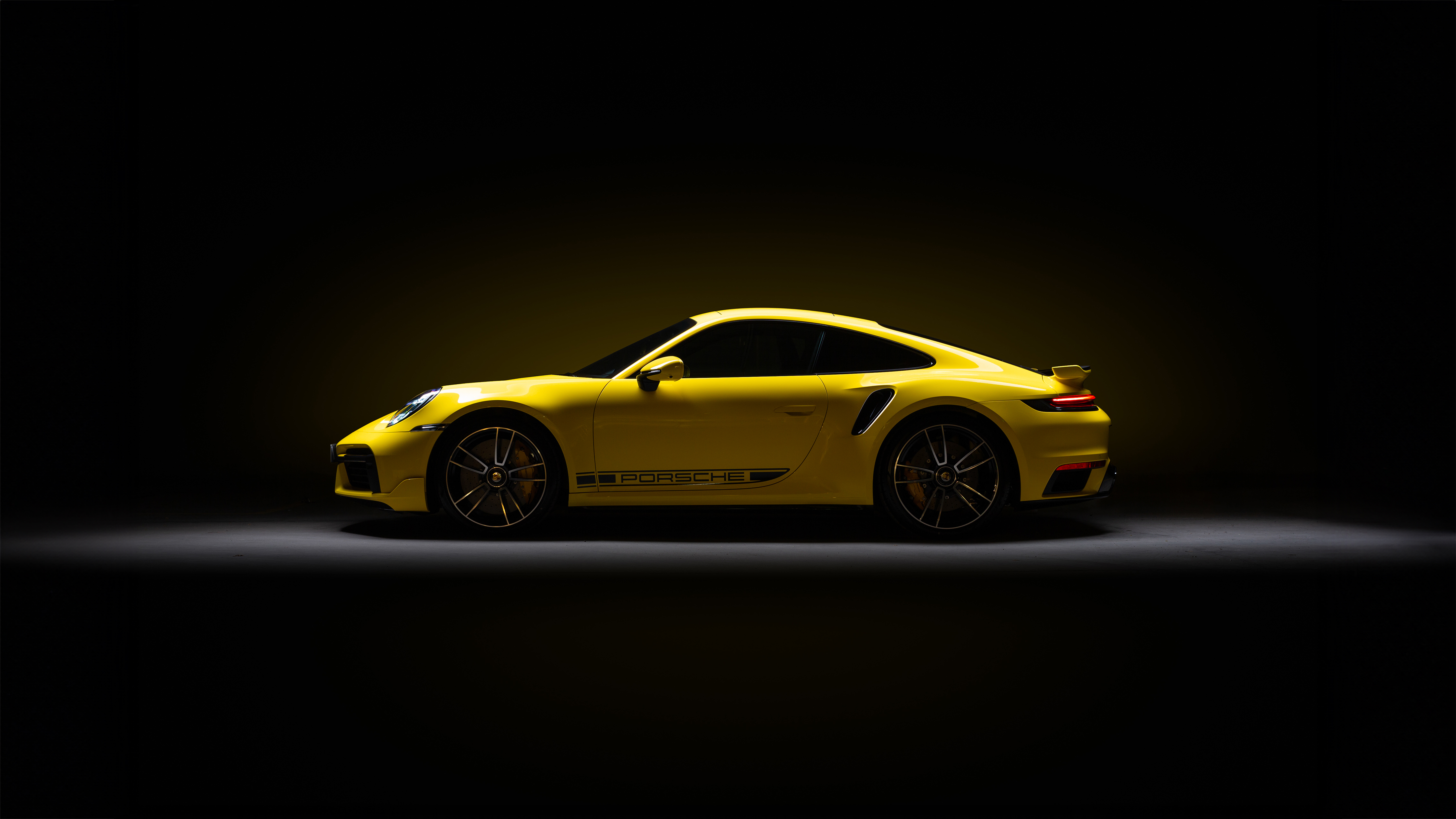 yellow porsche 911 4k 1698179728