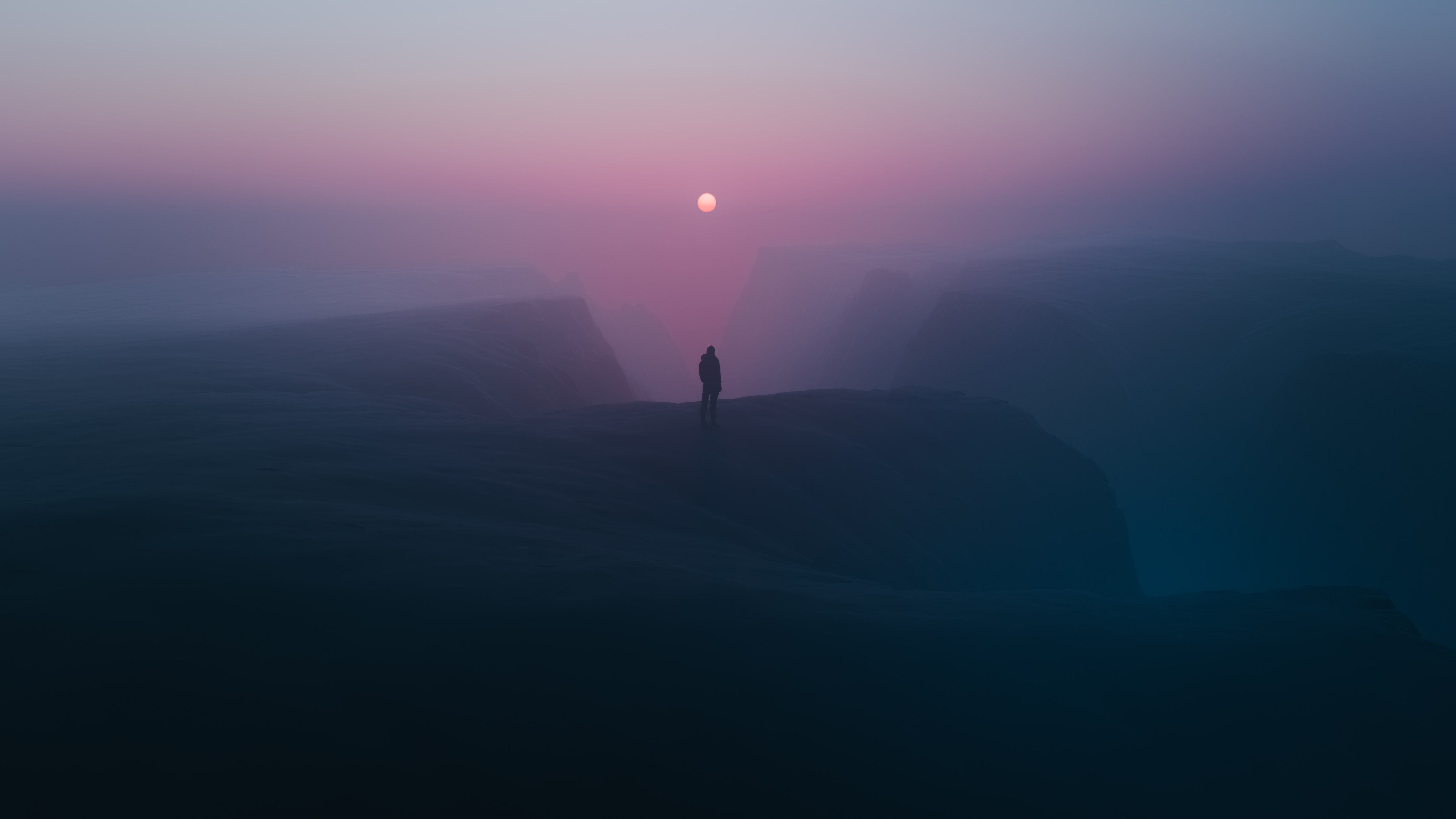 foggy horizons person standing at a top of mountains b4.jpg